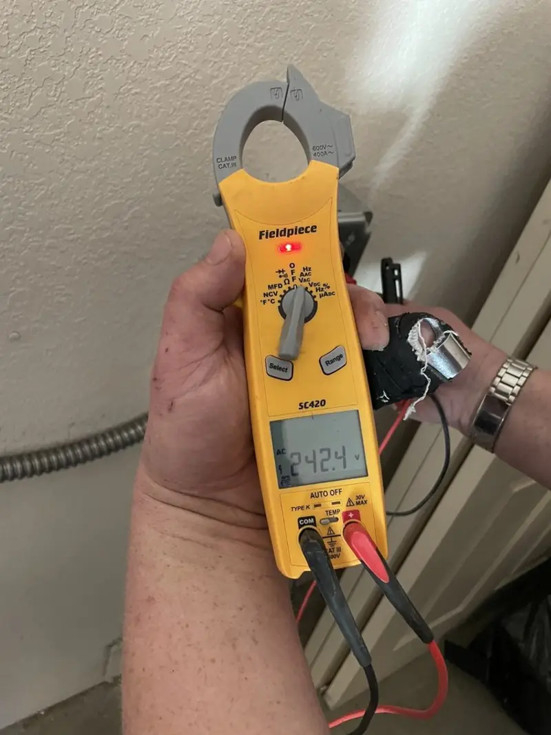 Voltage testing with clamp meter during Generator Installation in Southfield